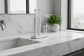 Base de carga doble cepillos eléctricos en baño